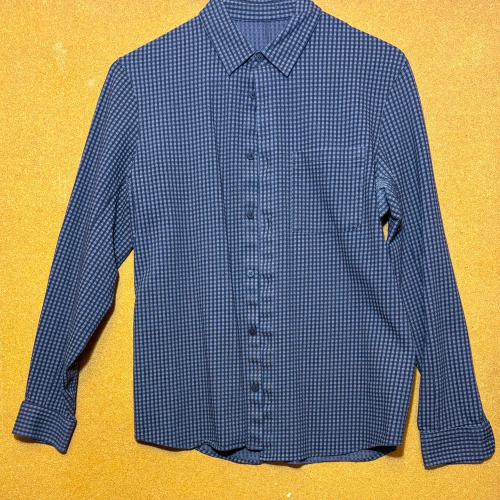 Men's long sleeve button down Lululemon Shirt
Size Medium